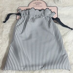 Wandering Moon drawstring laundry bag black and white stripes